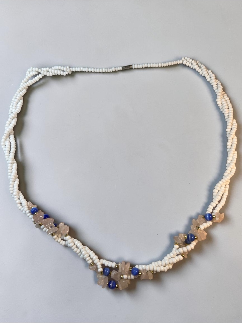 Handcrafted White Bead Necklace with Blue and Rose Accents